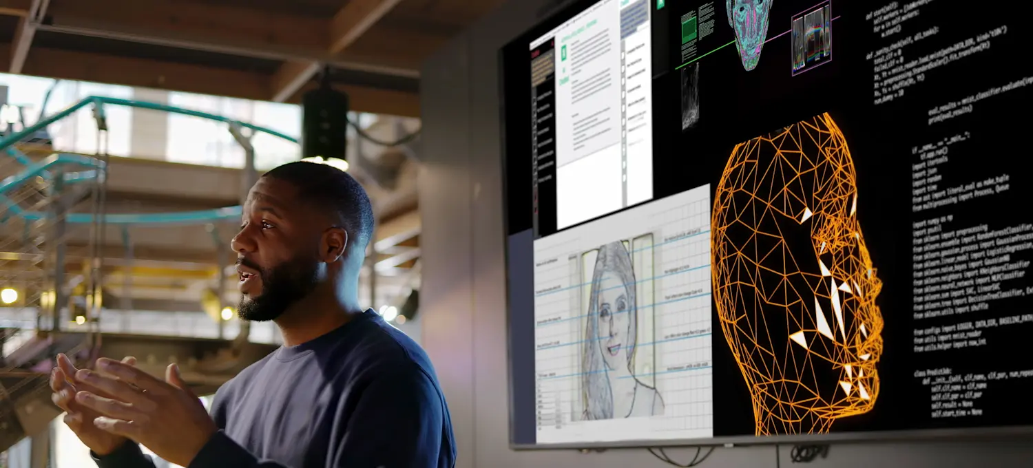 [Featured Image] A business professional is demonstrating the possibilities of new security using generative AI avatars.
