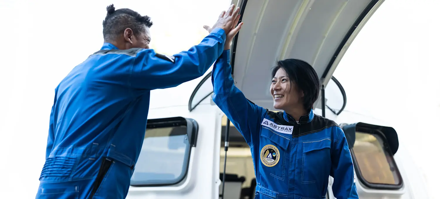 [Featured Image] A NASA professional congratulates their new co-worker on being hired by NASA.
