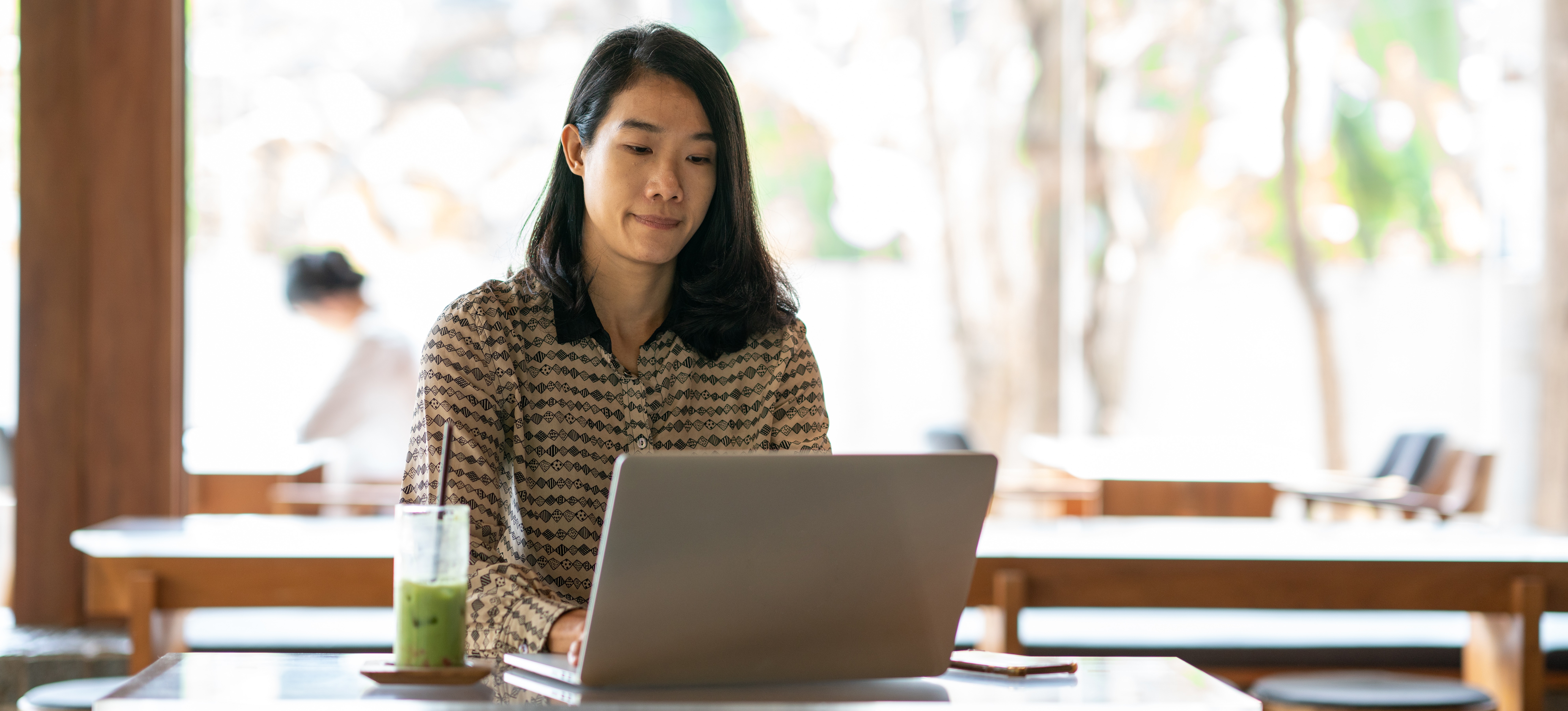 [Feature Image] An aspiring data scientist searches “What is batch normalization” on their laptop as they plan their coursework for their degree.
