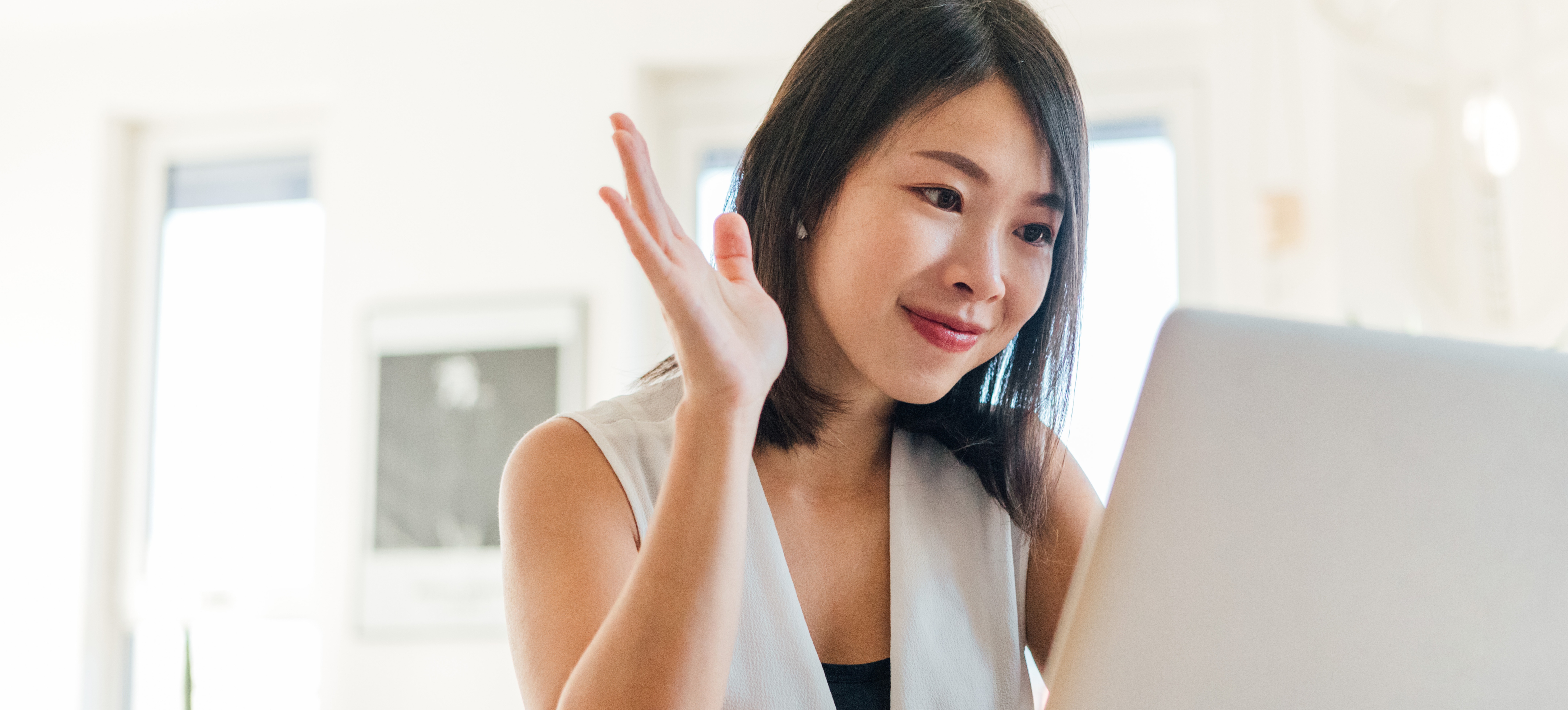 [Featured image] A young person sits at a laptop and participates in a video chat with a mentor explaining how to become a data analyst without a degree.

