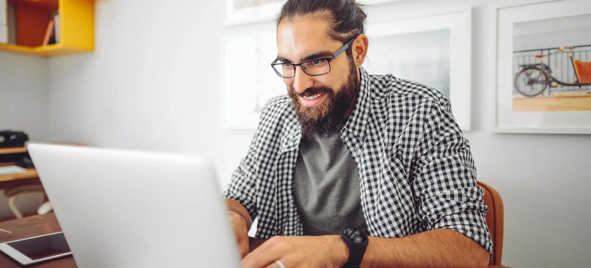 [Featured Image] A person explores the possibility of creating superintelligence software on their laptop. 