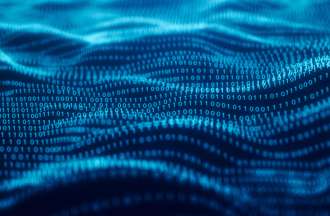 [Featured Image] Blue lines of binary code ripple across a black screen in waves.