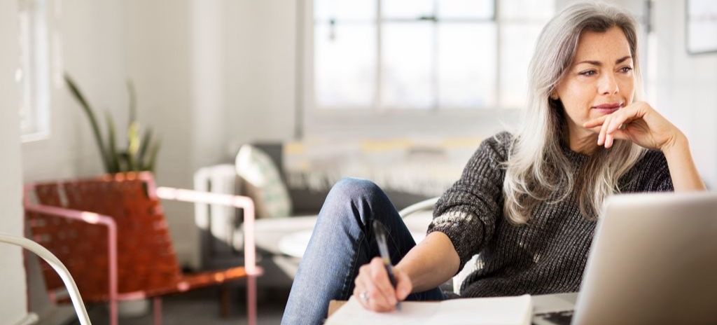 [Featured image] An IT support specialist is on their laptop taking notes on FAT32.