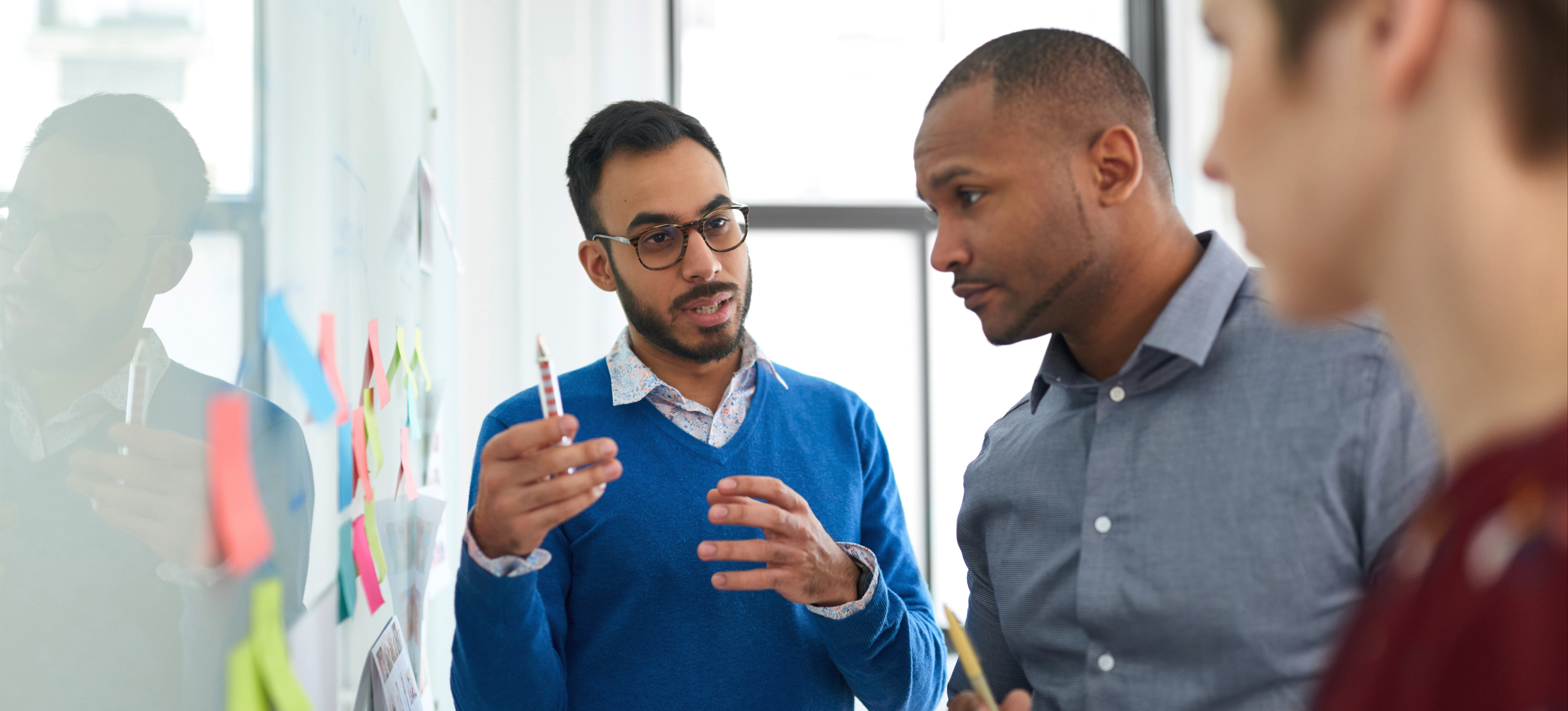 [Featured Image] A product marketing team puts their skills to use as they review a plan for an upcoming product launch.