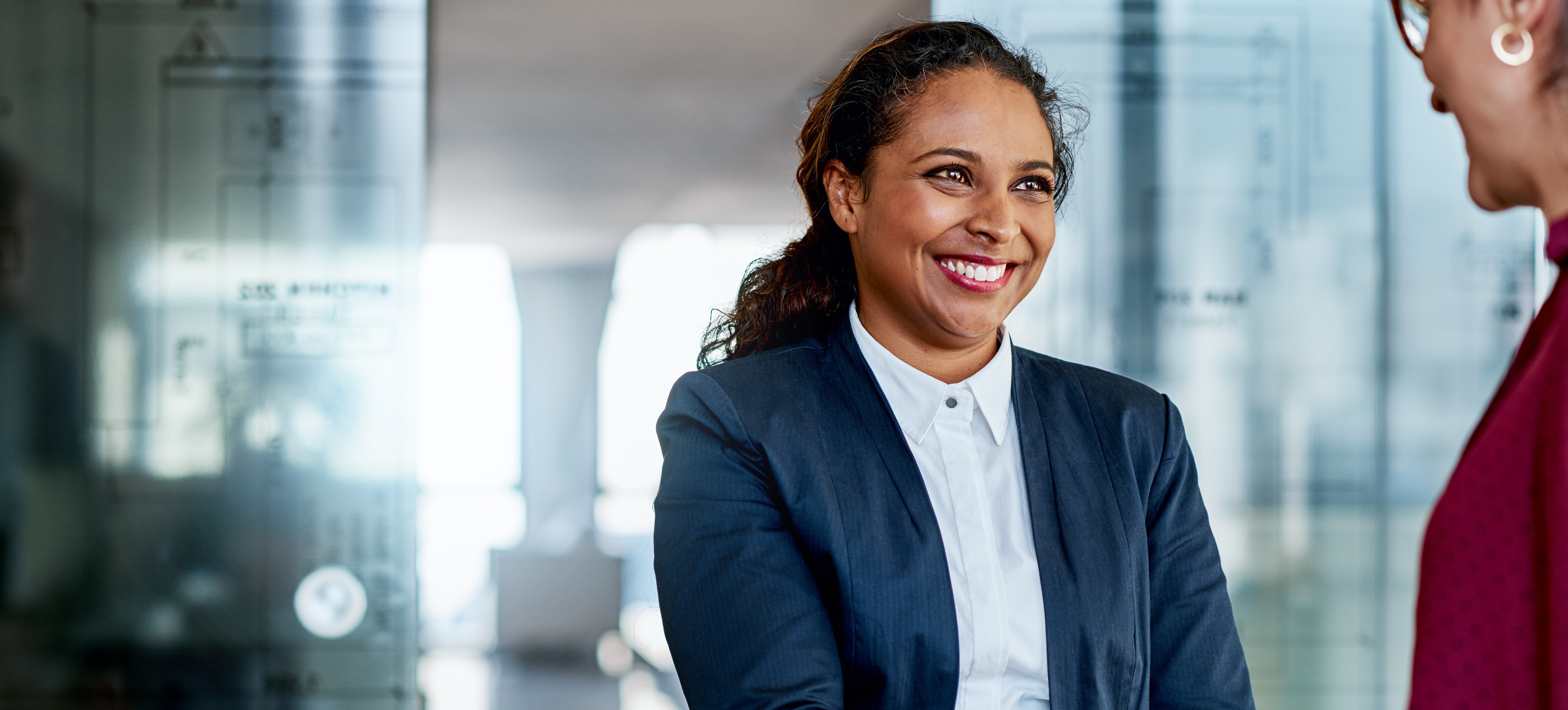 [Featured image] A barrister meets with a client after receiving their LLB.