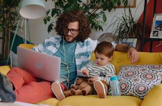 [Featured image] A cybersecurity analyst is working at home while researching about hardening. 