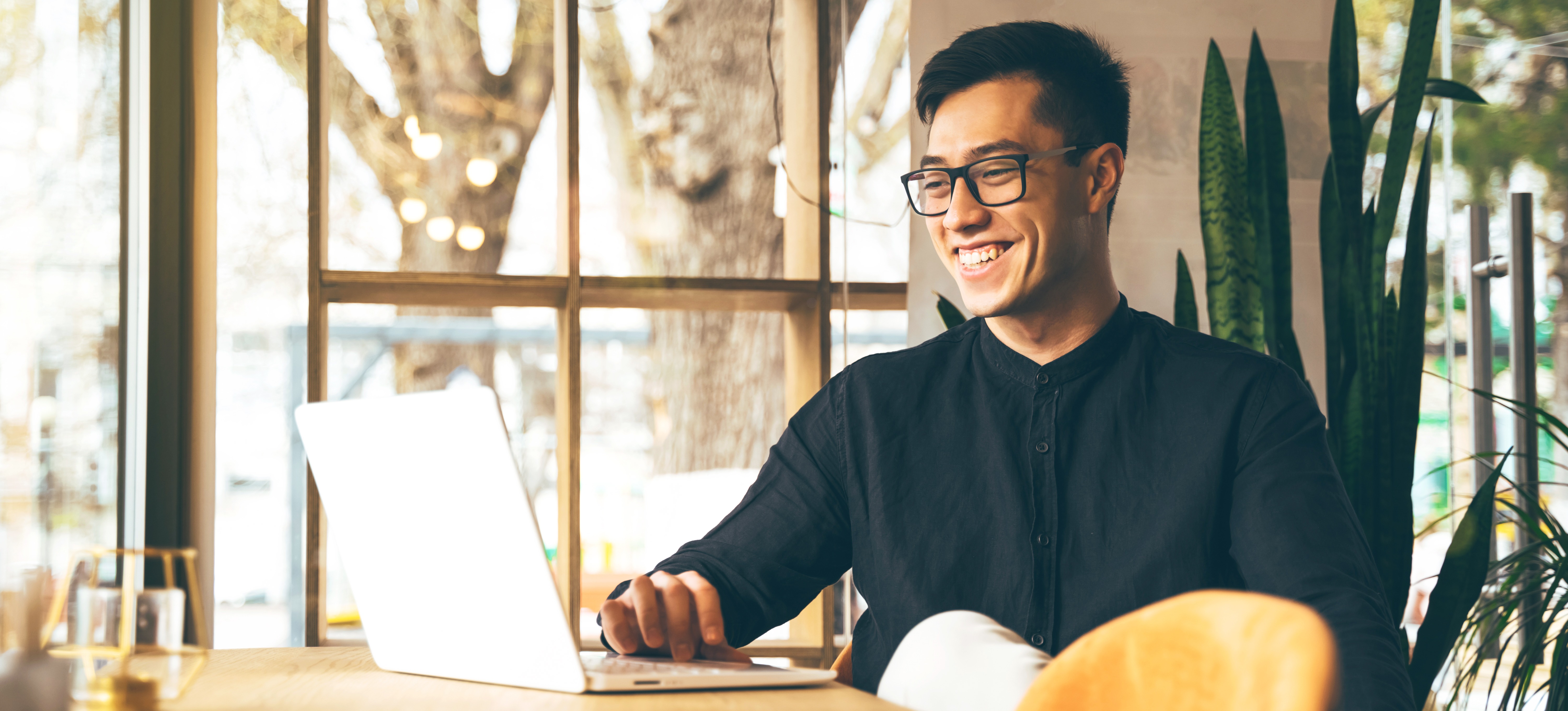 [Featured Image] An aspiring cybersecurity professional researches popular cybersecurity certifications as they make plans for their career. 

