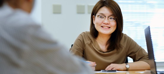 [Featured Image] A person talks about their weaknesses during a job interview.