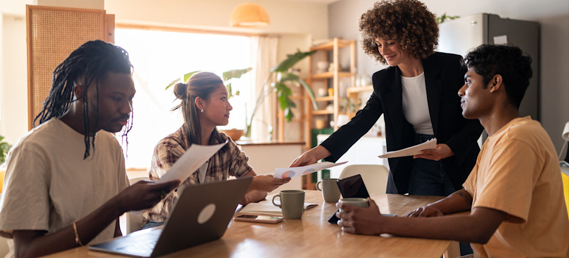 [Featured Image] A group of learners gather to study, preparing for an exam covering medallion architecture in their data engineering program.

