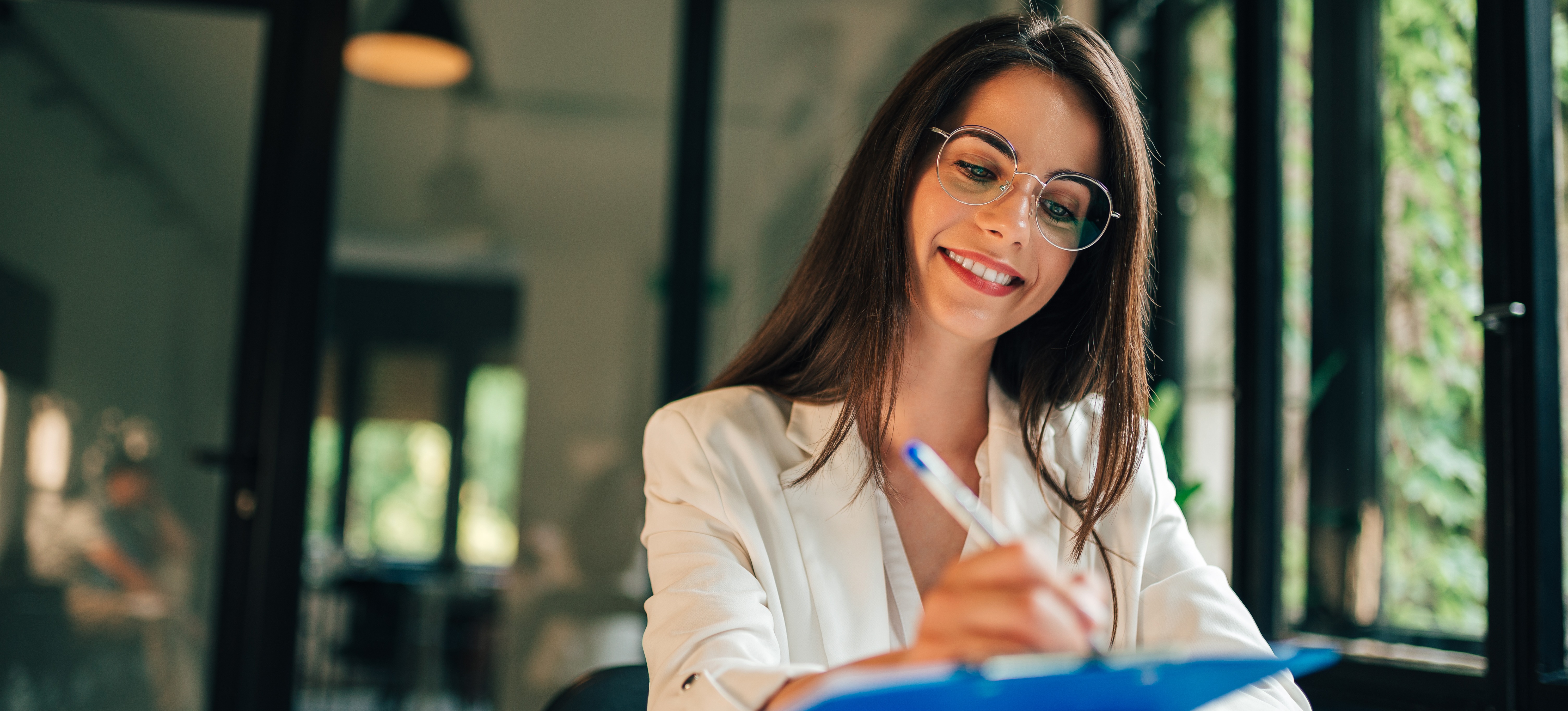 [Featured image] Smiling job applicant adds hobbies to a standout resume.