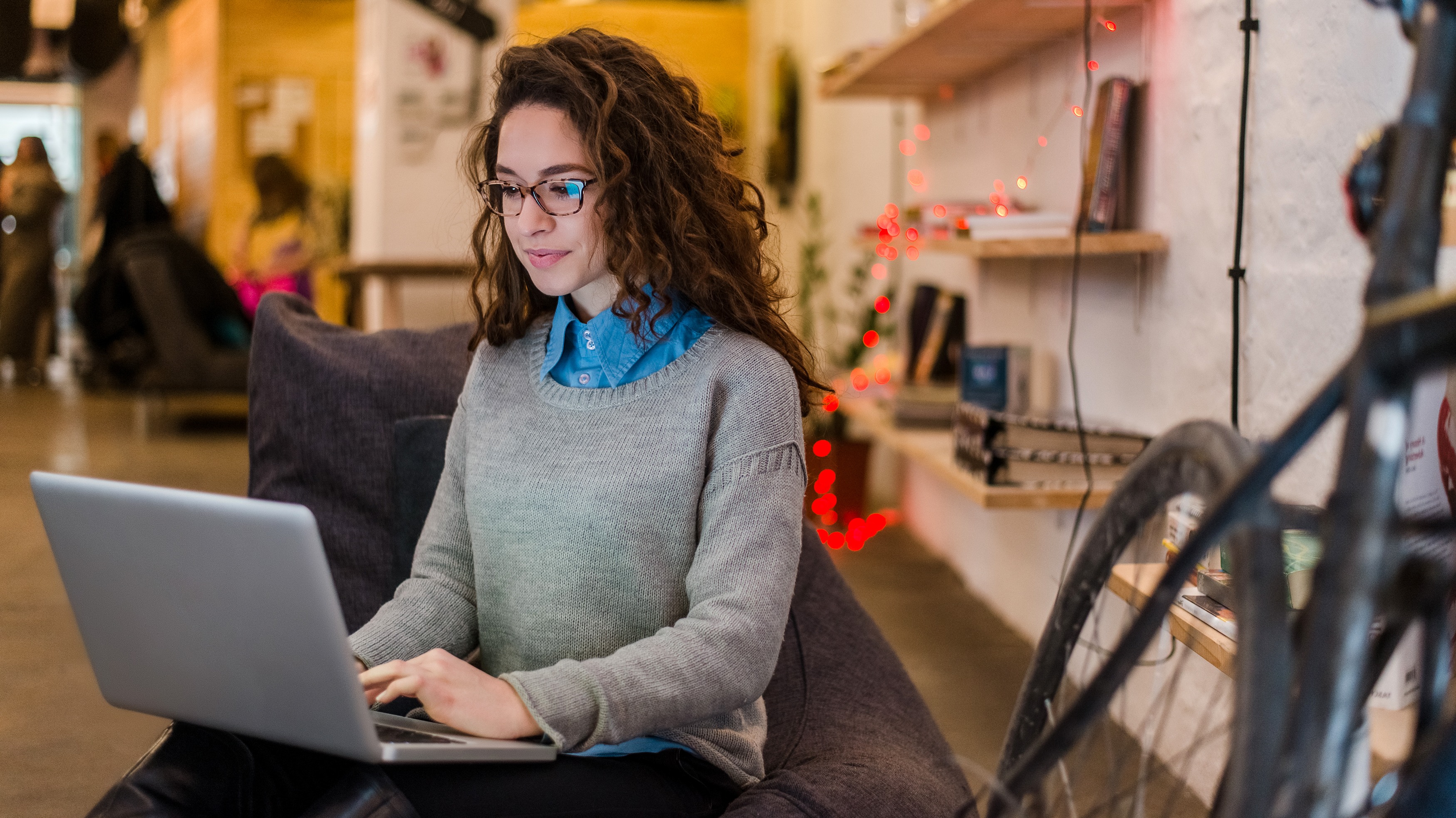 [Featured image] A software developer coding in Python on her laptop.