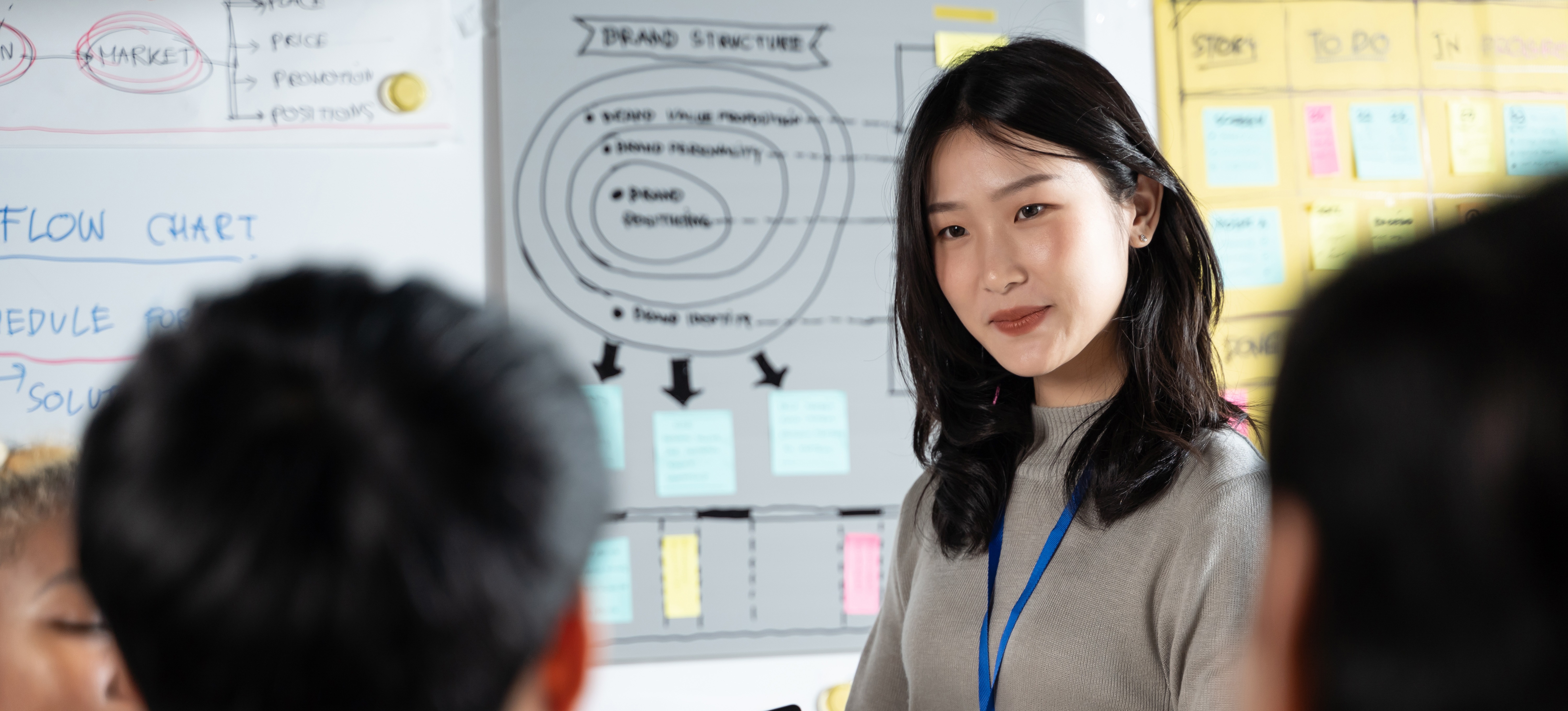 [Featured Image] A computer information systems student listens to during a class. 