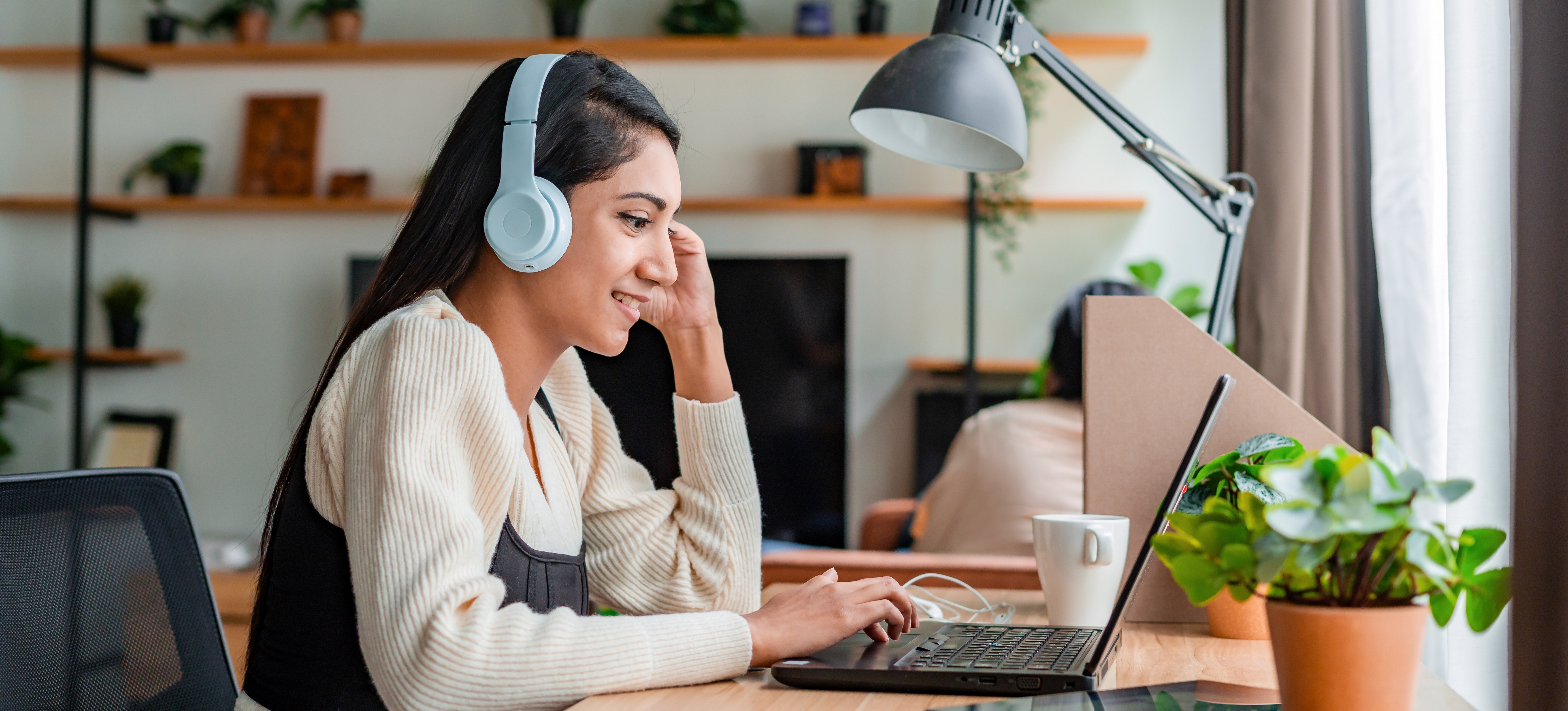 [Feature Image] After searching “What is Coursera,” a learner signs up for the online learning platform and selects courses to help prepare them for their career goals.
