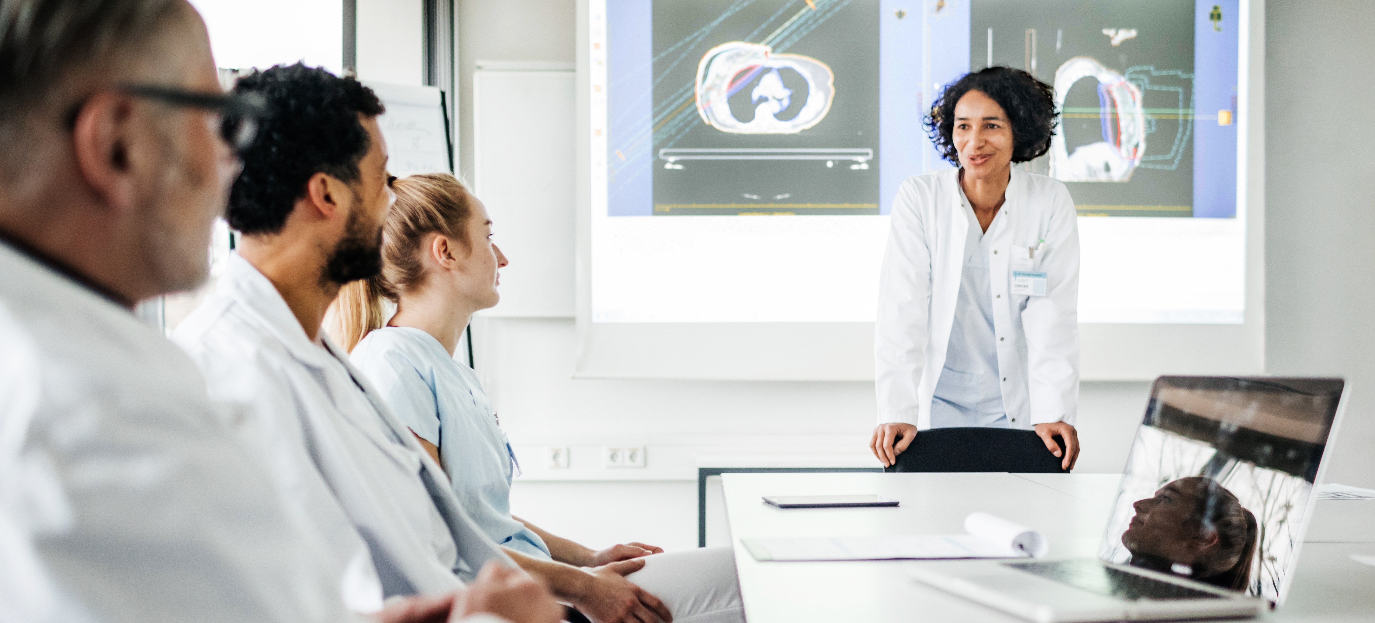 [Featured Image] Prospective clinical research associates attend a lecture as they learn essential terms, skills, and topics.
