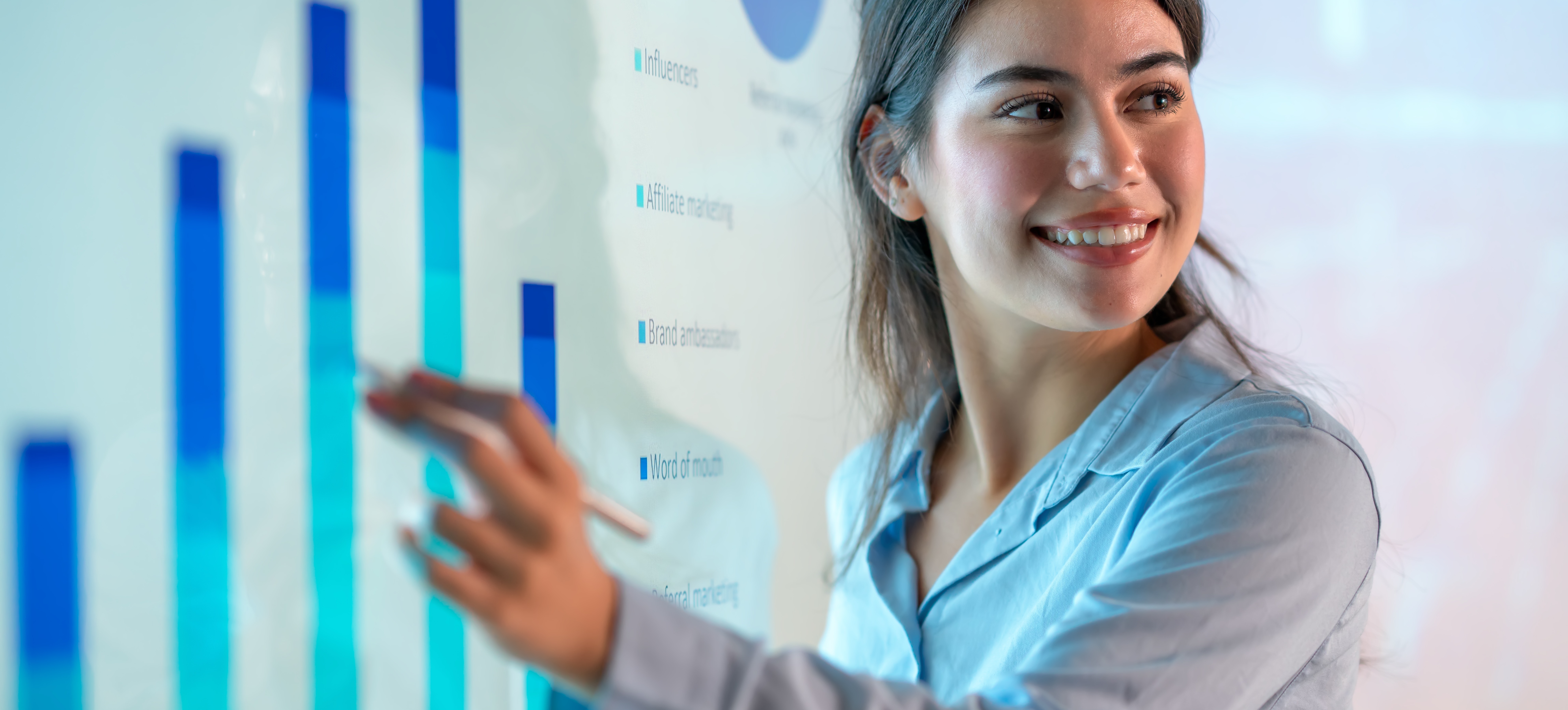 [Featured Image]: A PMO analyst explains how to improve the efficiency of the organization’s projects as part of a presentation to their team and the project manager.
