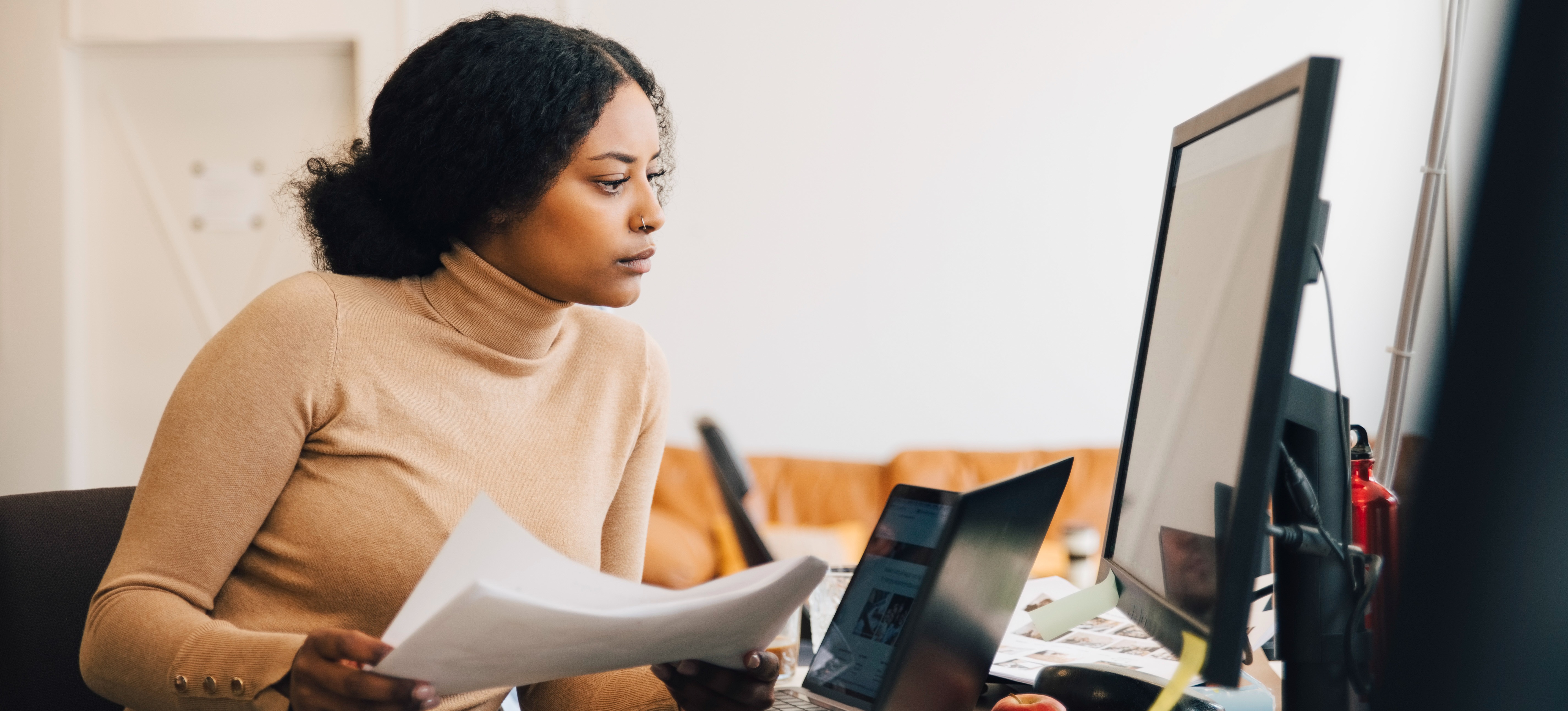 [Feature Image] A learner researches cloud computing degrees from various learning institutions as they plan their educational path.
