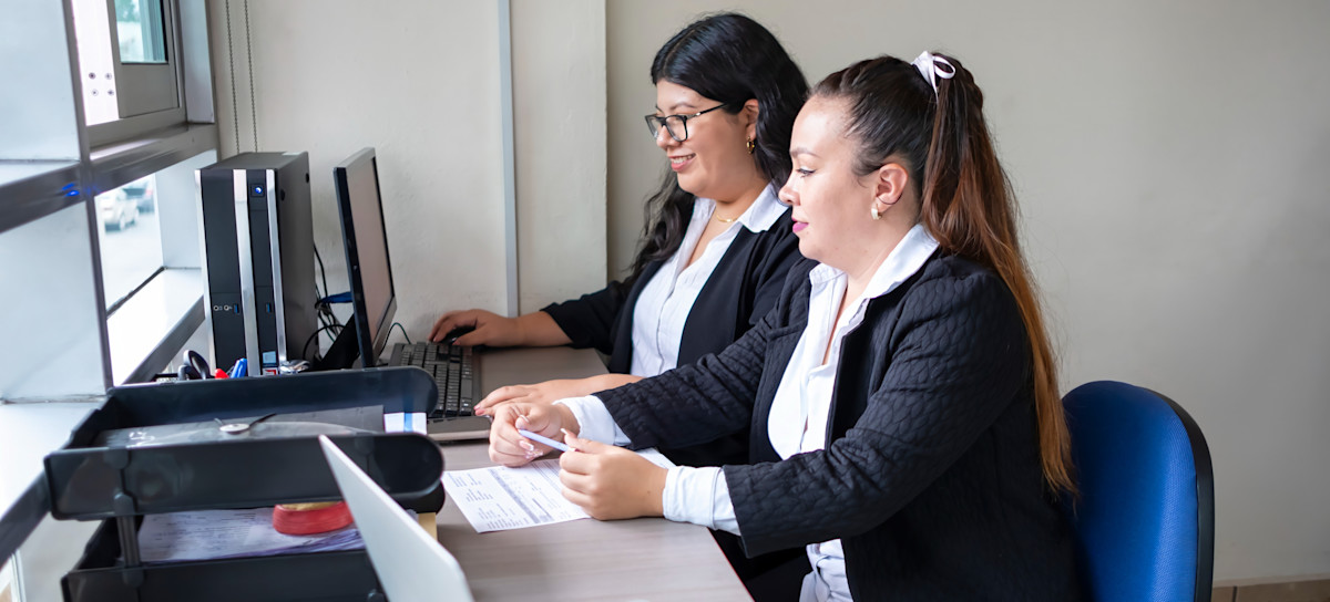 [Featured Image] Two health care data analysts discuss various results from an analysis about how to improve a hospital’s functioning.
