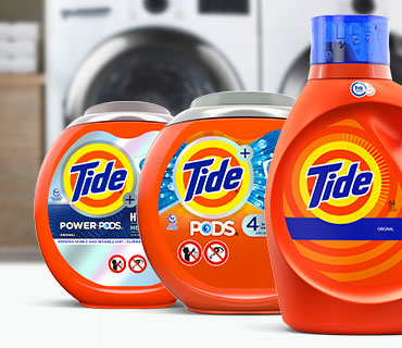Tide Liquid and PODS products in front of a washer