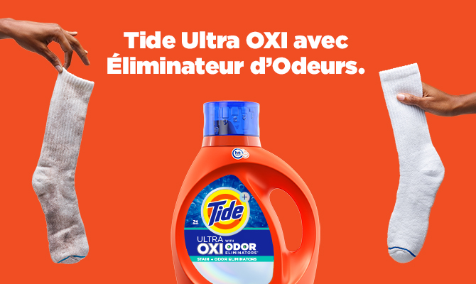 Le détergent à lessive liquide Tide Ultra OXI avec éliminateurs d’odeurs élimine les taches et combat les odeurs.