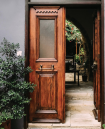 a wooden door with a window