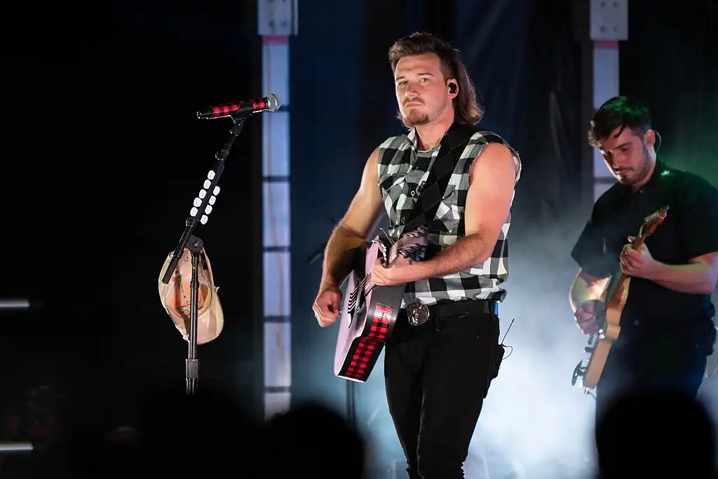 Morgan Wallen, an American country music artist performs his hit single “Whiskey Glasses” during Freedom Fest, June 28, 2019, at the Iron Horse Park, Fort Carson, Colorado.
U.S. Army photo by Spc. Robert Vicens