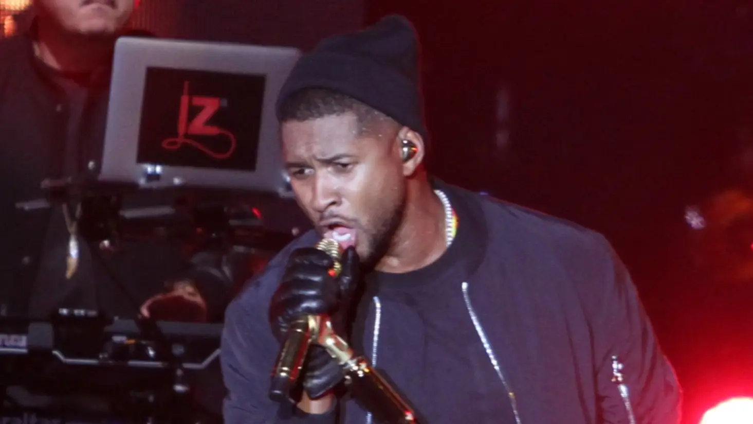 Usher performing in New Olreans, Louisiana for the Allstate Sugar Bowl Fan Fest, December 2015 by Tammy Anthony Baker (CC BY 2.0 DEED)