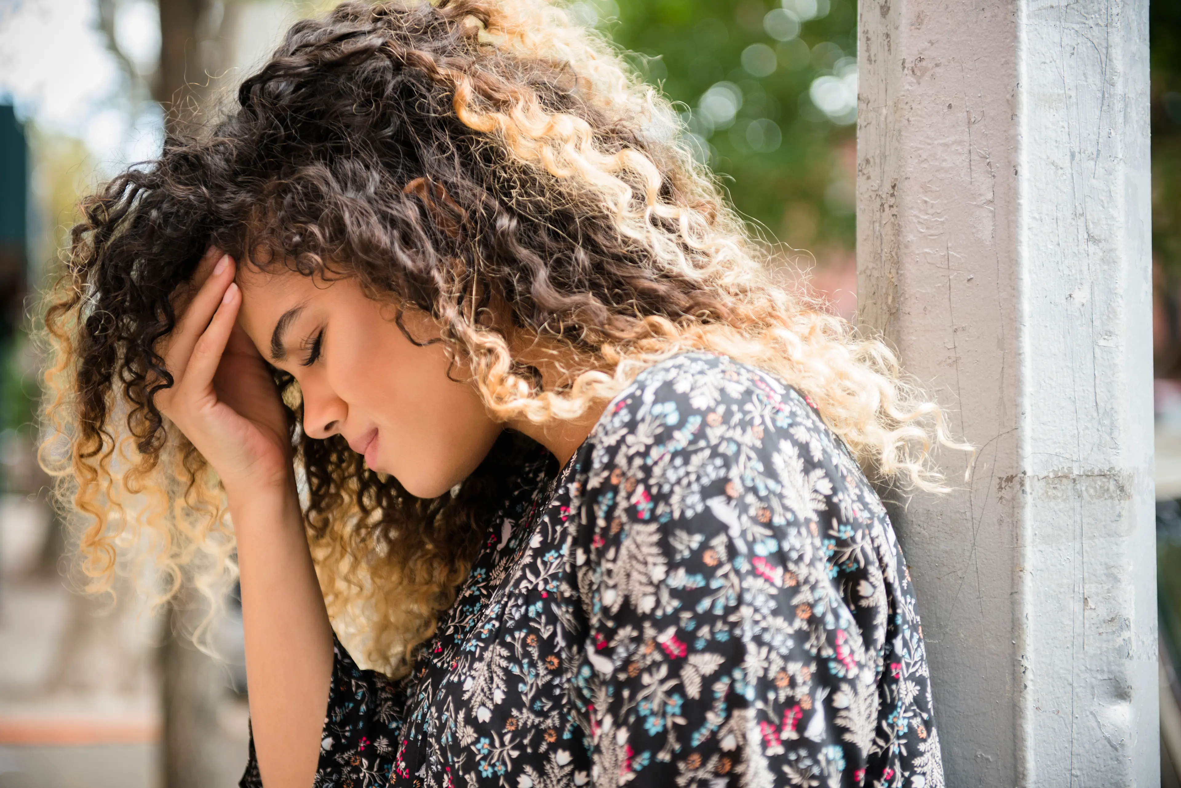 young woman feeling headache