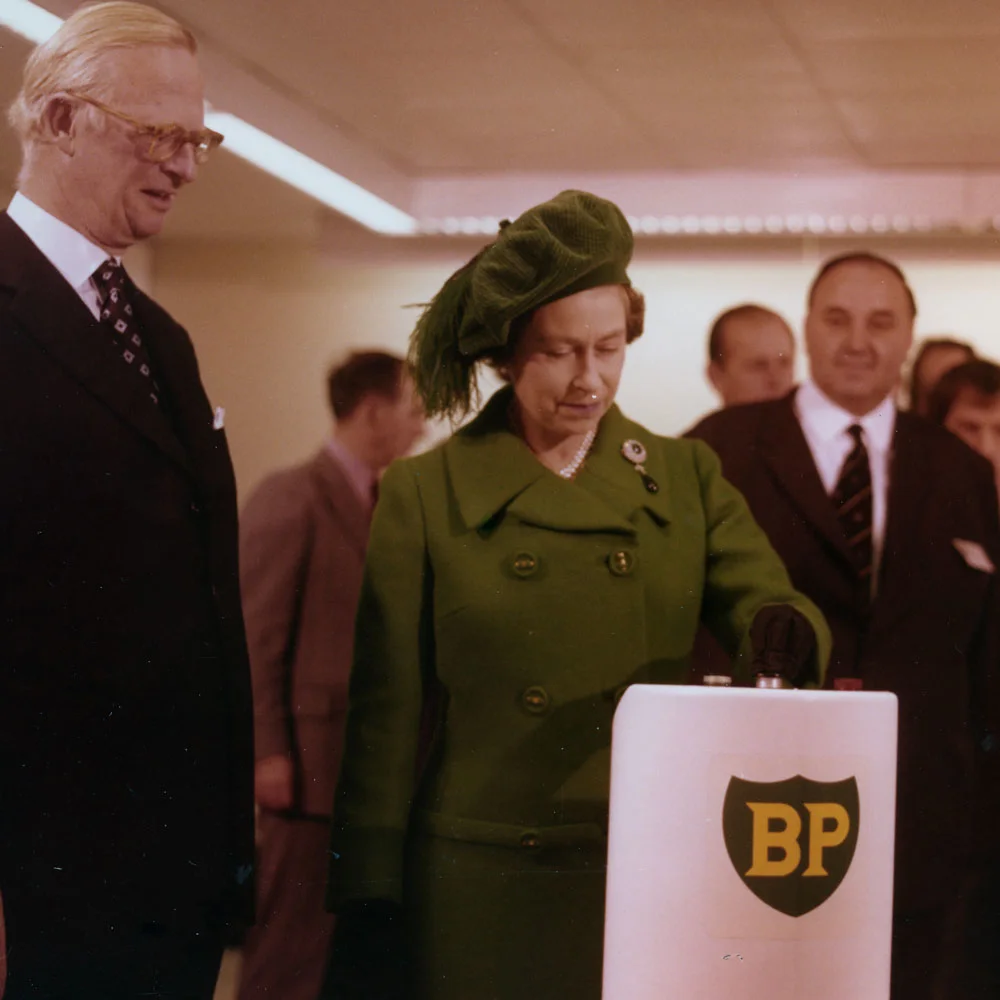 The Queen presses the button to start first oil from the Forties field, 1975