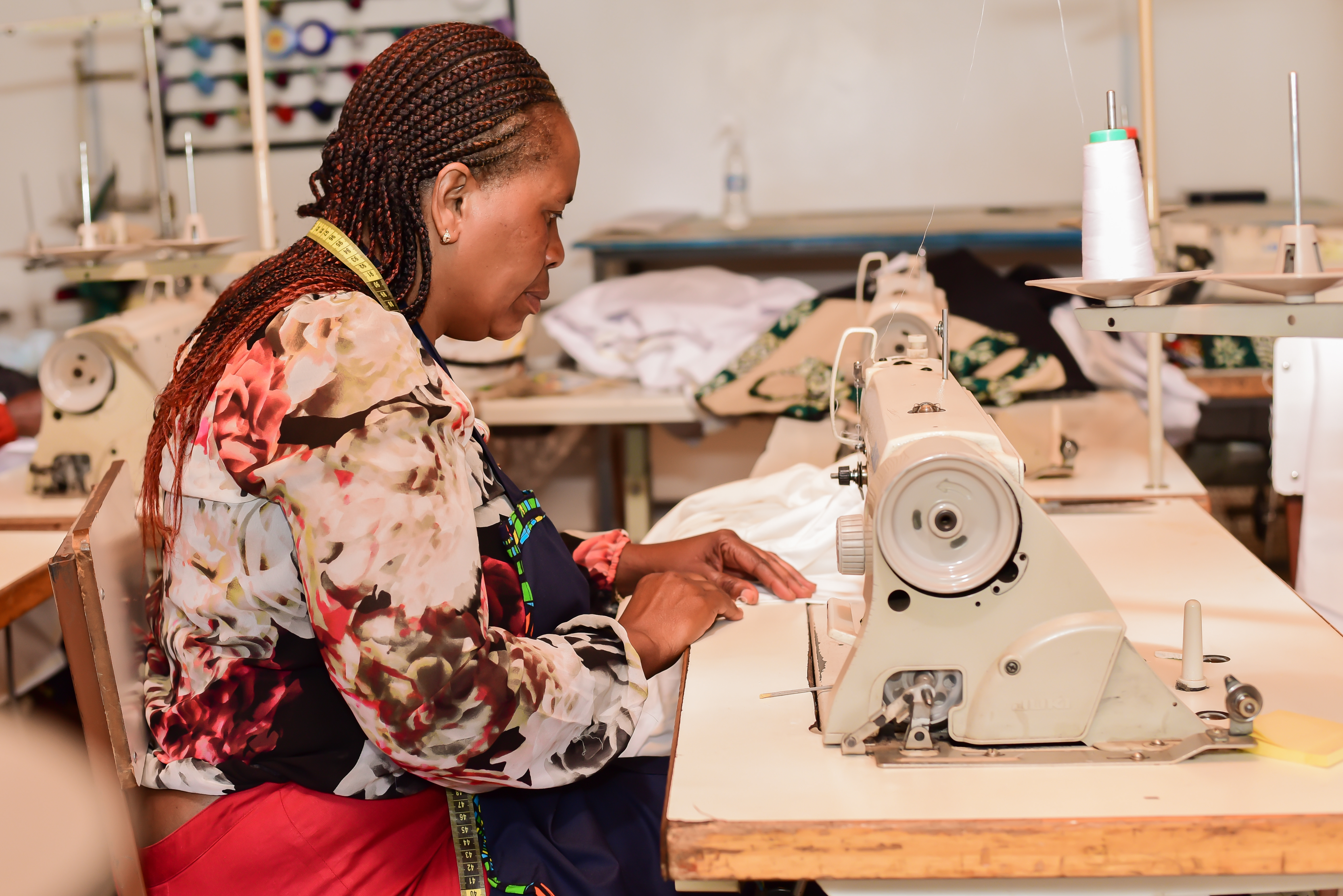 Woman working with a sewing machine
