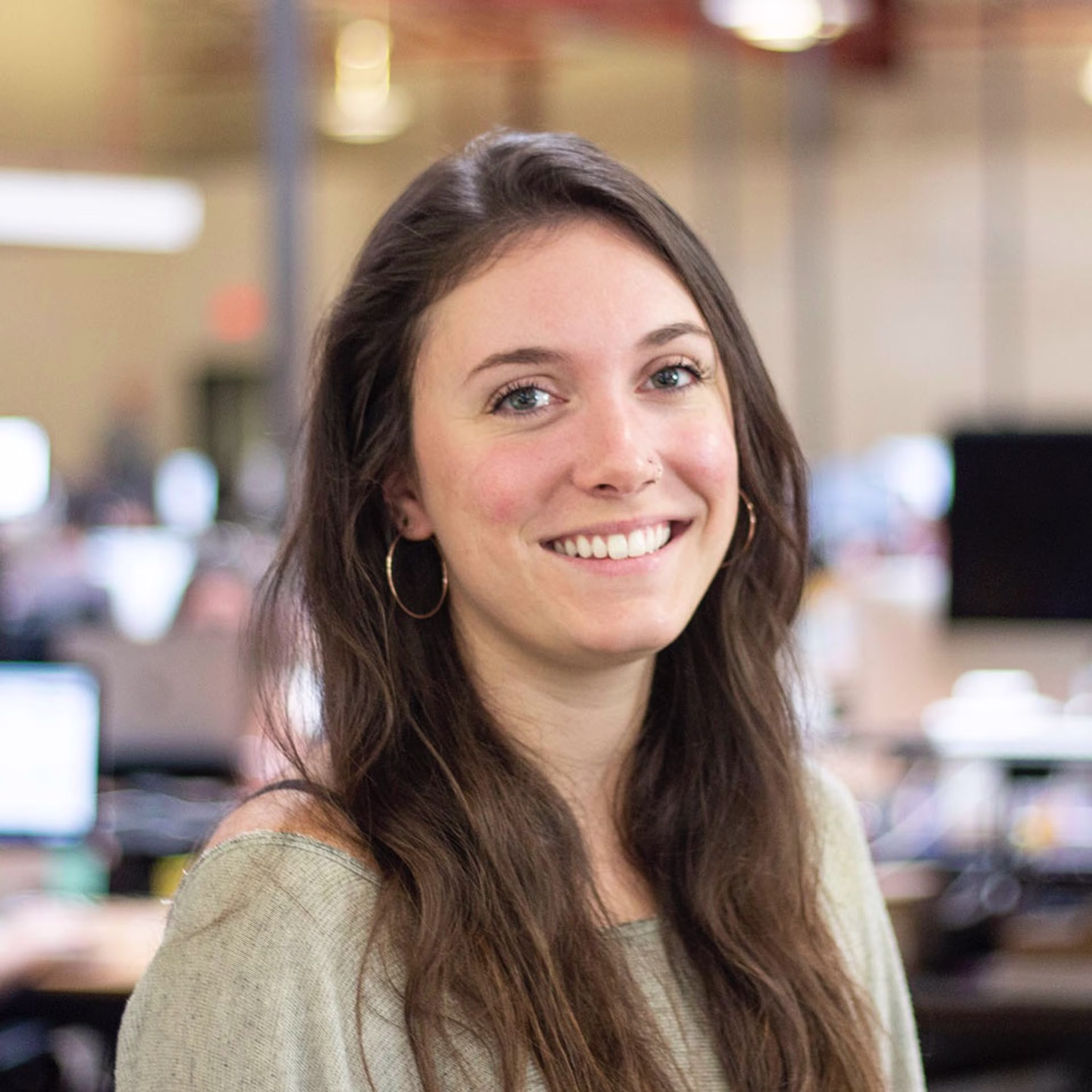 headshot of Sr Editor Carolyn Santa Maria