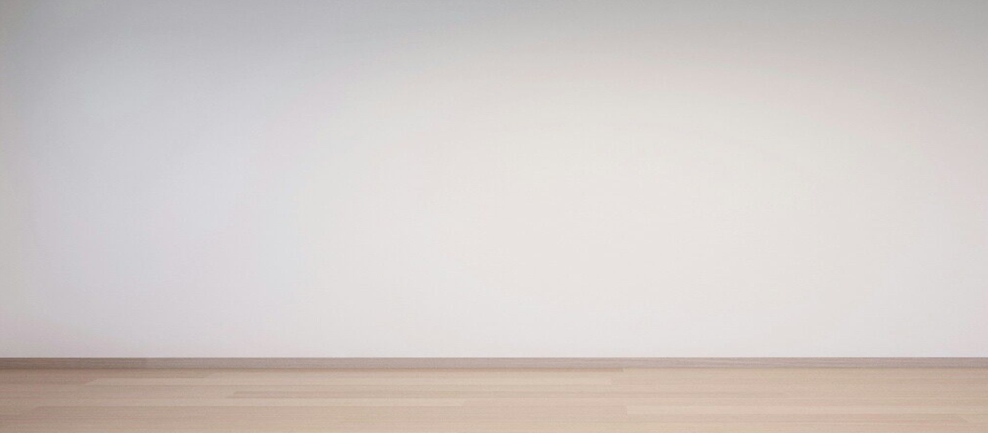 Image of an empty room with white wall