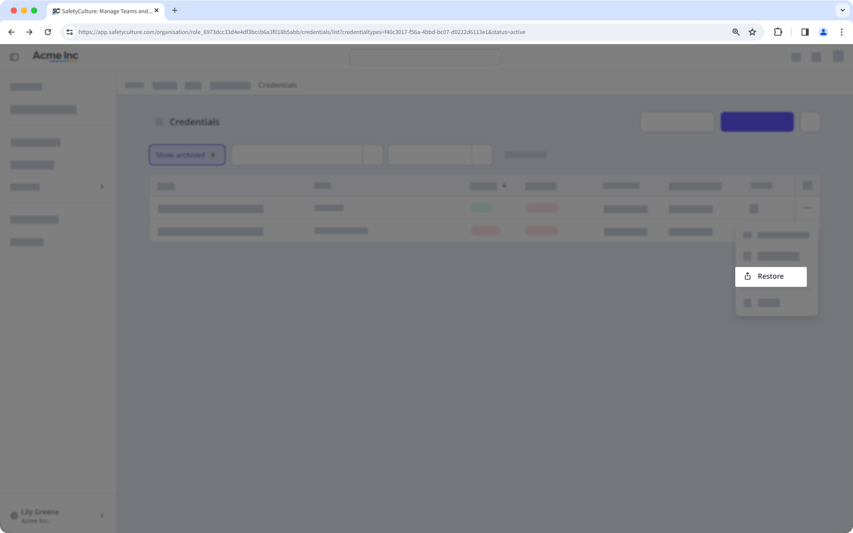The archived credentials list with a credential's "Restore" button visible.