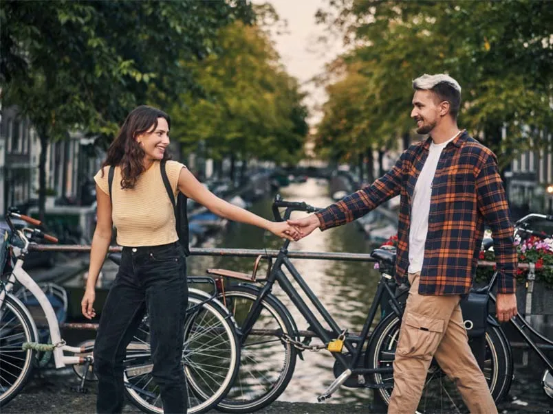 A couple on a bridge in Amsterdam
