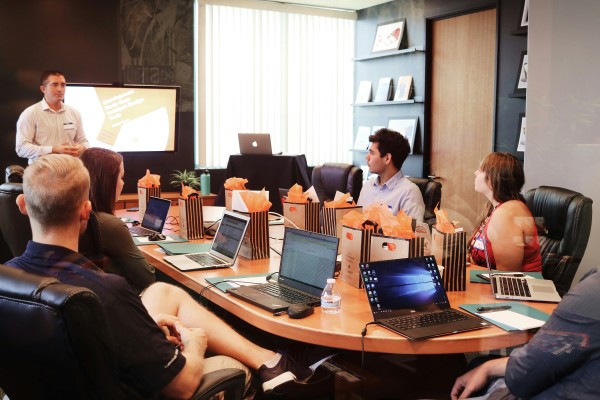 Employees taking part in a roundtable meeting