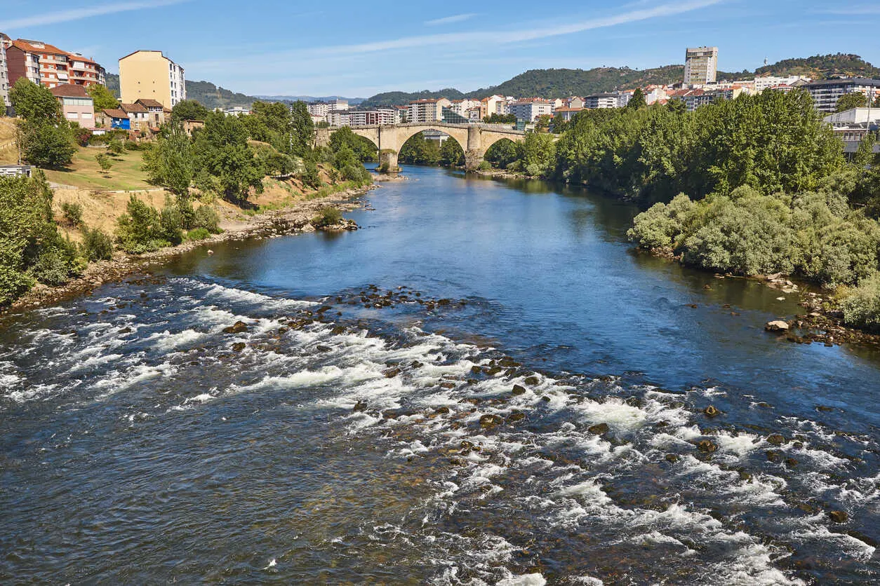 Roman-era bridge spanning the Miño River in Ourense, Galicia.