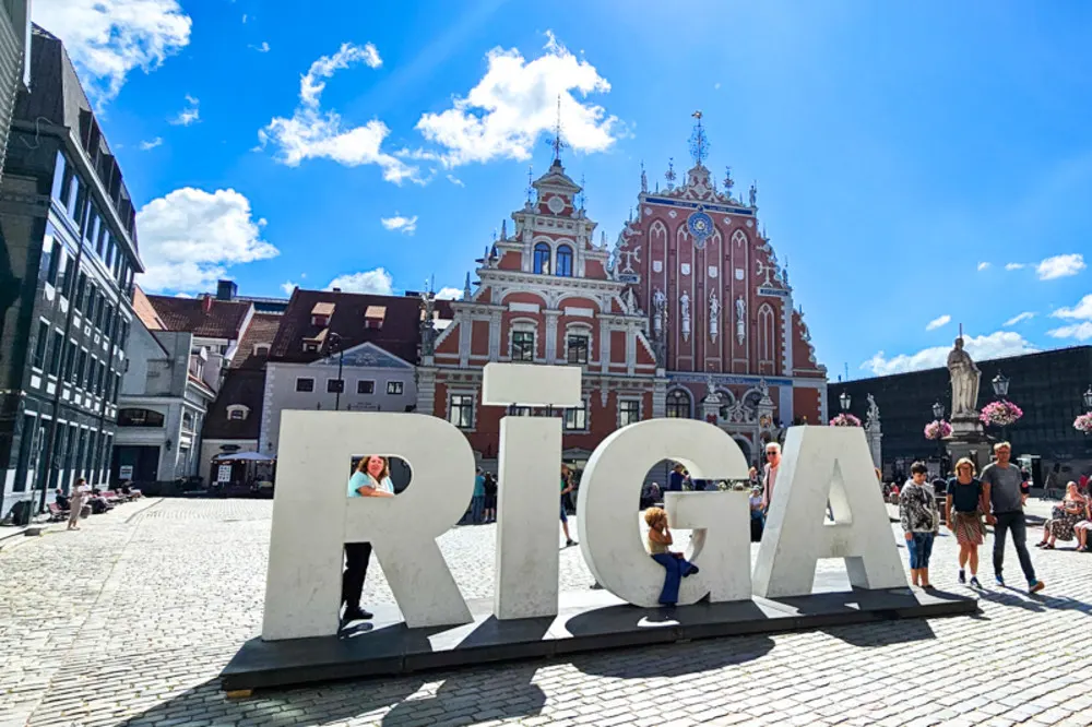 A warm welcome awaits in Riga’s iconic Town Hall Square.