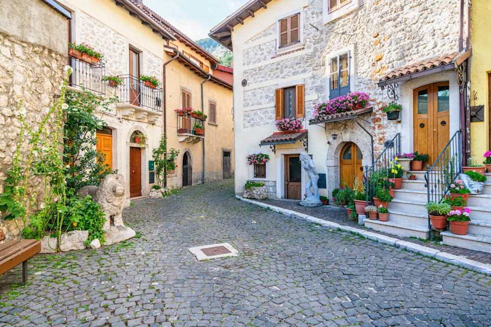 Italy’s countryside delivers romance, history, and affordable village life.