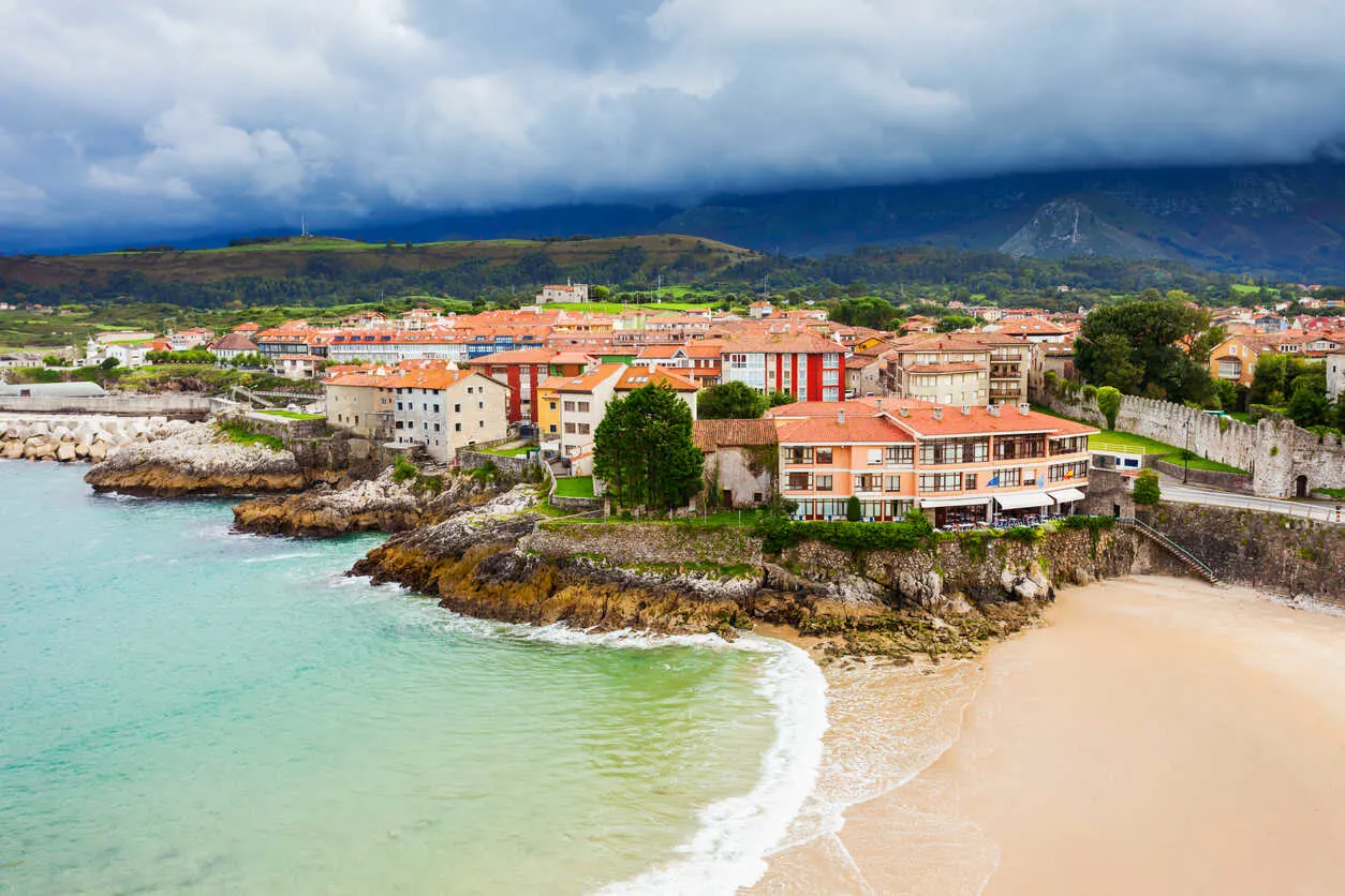 An aerial view of Llanes Beach, nestled along the picturesque coast of Asturias.