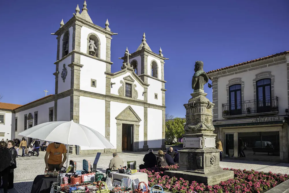 Street vendors set up outside the church in Esposende’s historic center.