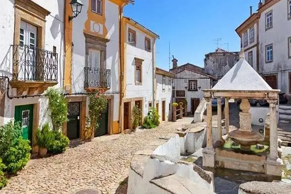 Take a break at the fountains around town while bargain hunting for historic homes in Castelo de Vide.