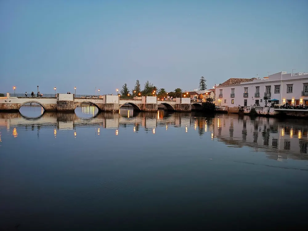 Whitewashed Tavira charms with river views and easy access to island beaches.