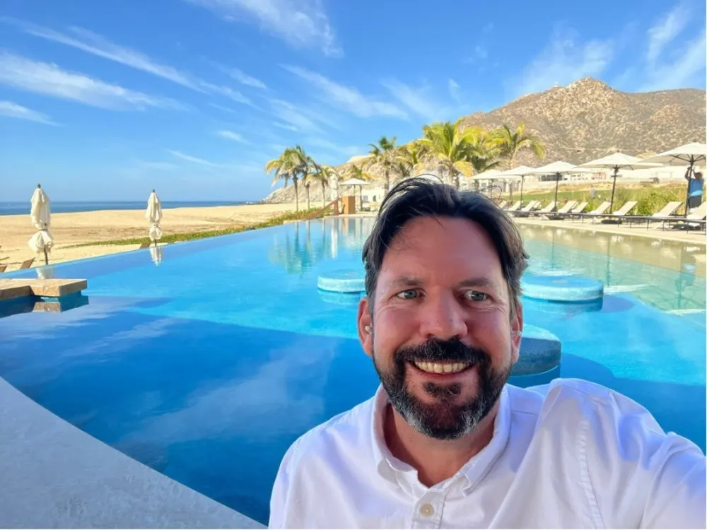 Here I am in the 5-star Quivira resort, where I bought alongside RETA members at incredible off-market pricing.