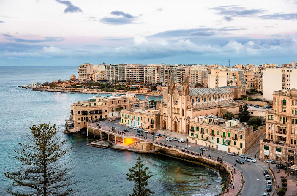 Sliema’s lively promenade is perfect for cafes, shopping, and people-watching.