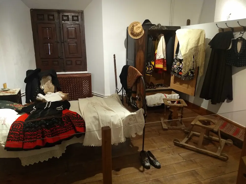 Traditional Castilian clothing on display at the House of Deanes Museum in Ávila.