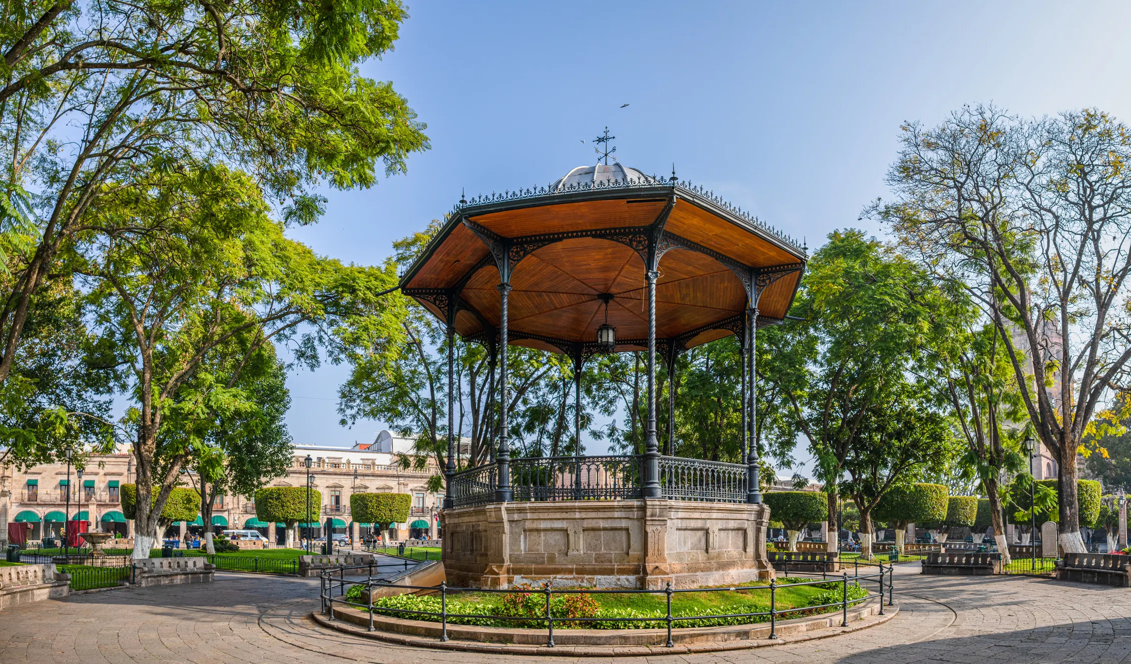 "At dusk, the plaza fills with children playing, couples strolling, and teenagers flirting."