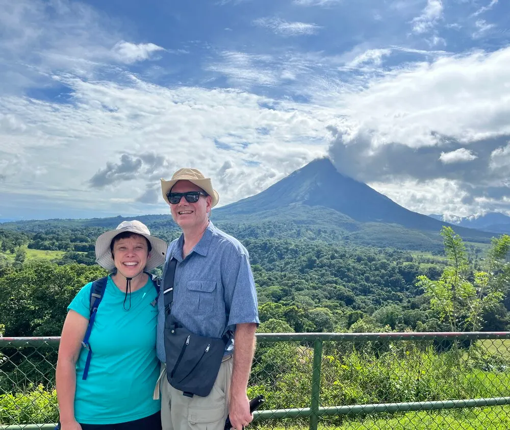 Taking in the breathtaking views of Arenal Volcano on a sunny day in La Fortuna.