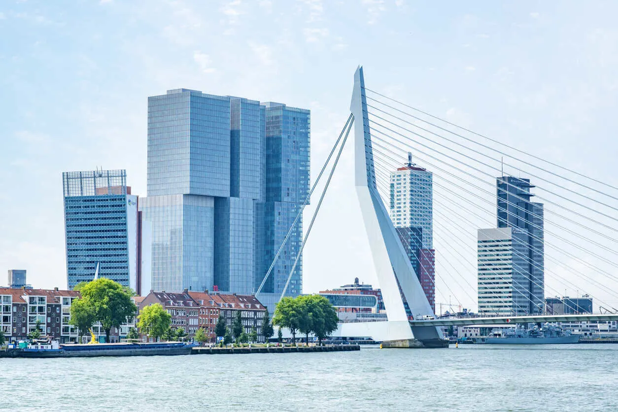 The iconic Erasmus Bridge, known as “The Swan,” spans the Maas River.