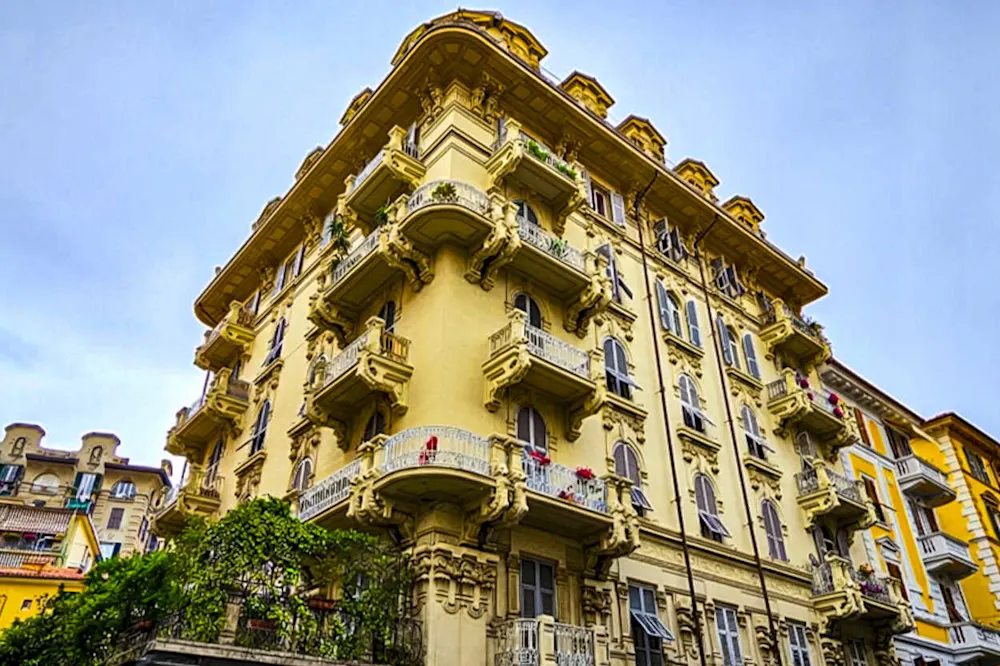 La Spezia’s Art Nouveau balconies burst with flowers and Riviera charm.