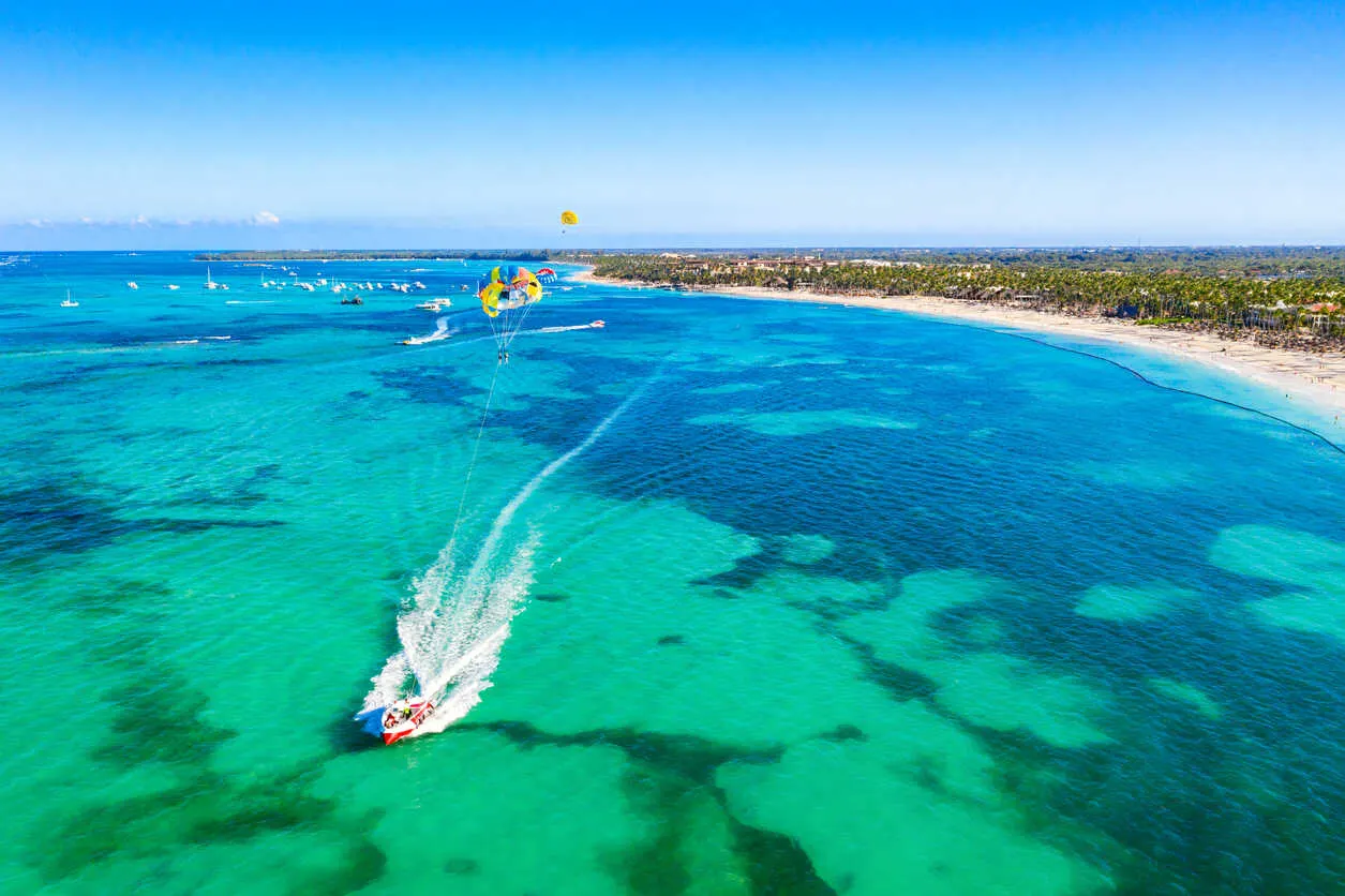 Parasailing over Bavaro Beach, where adventure meets the beauty of the DR.