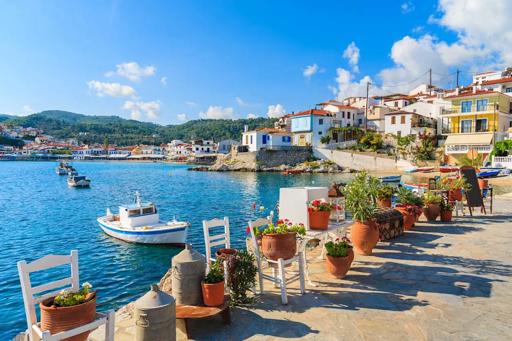 Sunshine, seaside cafés, and simple pleasures define Greek living.